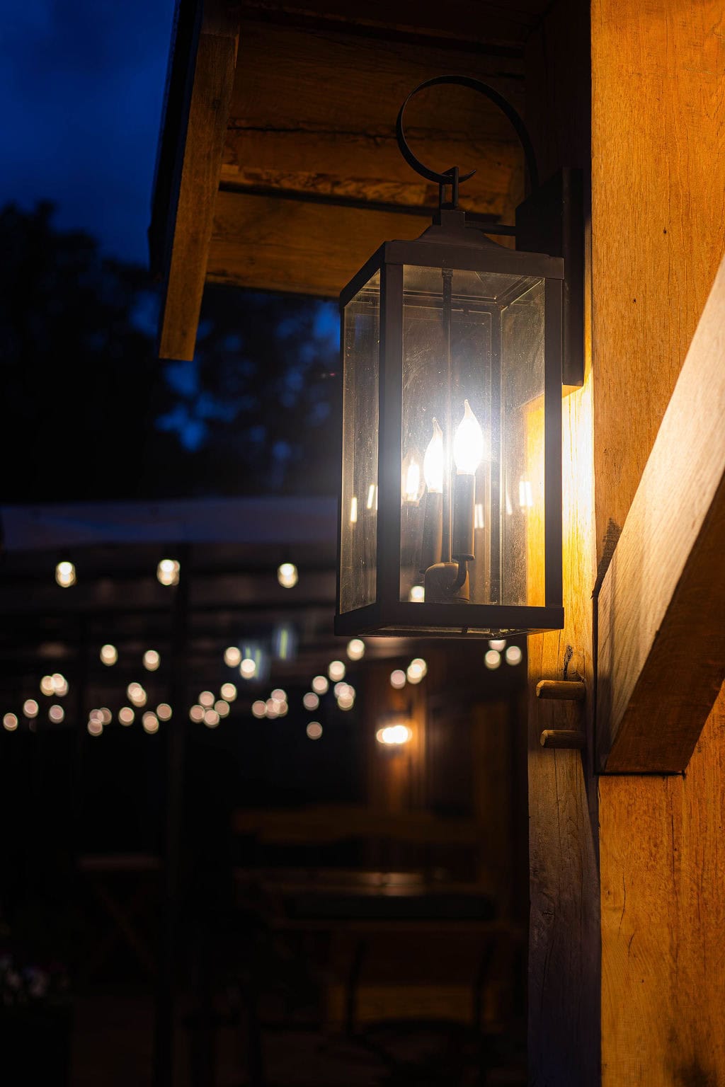 Beautiful outdoor lantern lighting at Belle Stone Venue, creating a warm and welcoming ambiance for events and gatherings in a rustic setting.