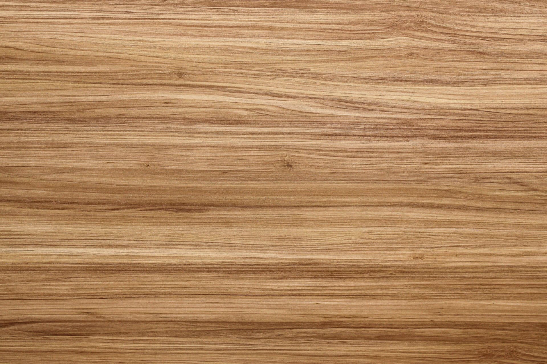 Smooth wooden surface perfect for wedding receptions and events at Belle Stone Venue. Elegant, natural wood decor ideal for creating a warm, inviting atmosphere.